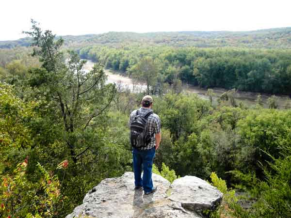 Over 2,000 acres of lush forests, meadows, and riverside bluffs